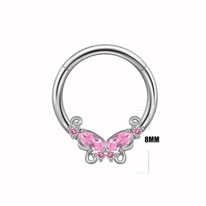 Close-up of 8mm silver surgical steel nipple ring with pink zircon butterfly detail