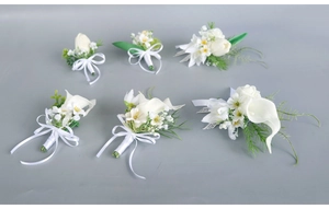 Set of 6 elegant white calla lily and tulip boutonnieres with green leaves and ribbons