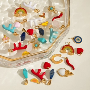 Various cute colorful stainless steel pendants including rainbow and evil eye charms