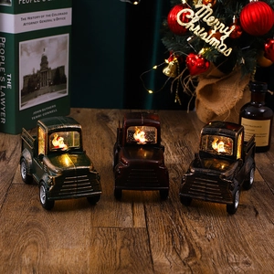 Vintage Christmas truck lanterns with glowing Santa in green, brown and black finish