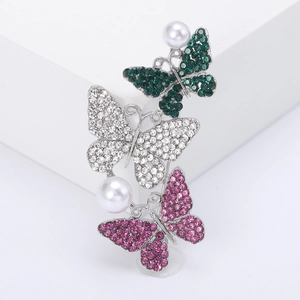 Vintage alloy butterfly brooch with green, white and pink wings, faux pearls and rhinestones
