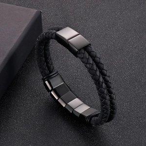 Close-up of black braided leather double-layer bracelet with matte magnetic clasp