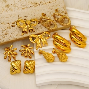 18K gold plated titanium steel earring set featuring bow and geometric floral designs
