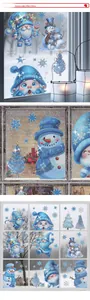 Close-up of blue and white Christmas window clings featuring gnomes and snowflakes