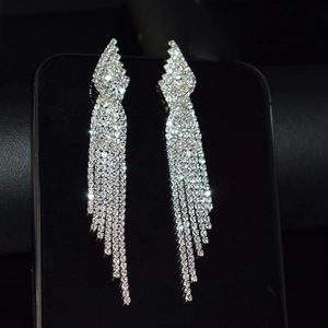 Elegant long rhinestone tassel earrings in silver finish for wedding parties and events