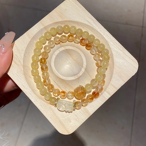 Set di bracciali Citrine Pi Xiu con perline di cristallo giallo e ciondolo dorato