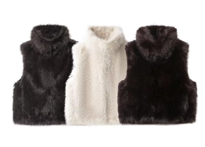 Detailed flat lay of faux fur vests in black, cream white and dark brown colors