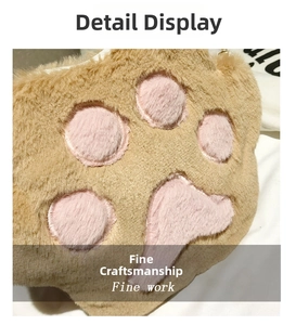 Close-up of plush bear paw bag featuring soft khaki faux fur and pink texture details