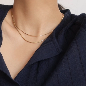 Minimalist S925 sterling silver gold snake bone chain necklace layered on model wear