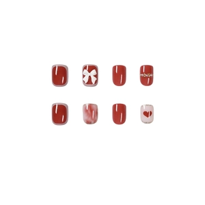 Short square rose red press-on nails with 3D bows, glitter, and heart charms