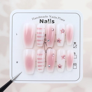 Pink blush gradient press-on nails with star patterns and rhinestones, 10-piece set