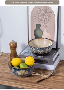 Artistic detail of ceramic salad bowls with vintage floral and bohemian patterns