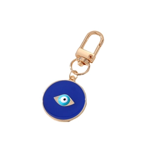 Golden Evil Eye keychain with deep blue enamel and hook for bags and accessories