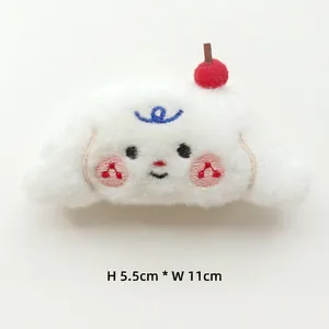 Detail of plush puppy brooch with cherry decor, measuring 5.5cm height and 11cm width