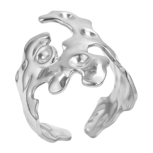 Detailed view of the irregular lava design and adjustable open band on a silver ring
