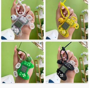 Mini retro handheld Tetris game console keychain in four vibrant colors with functional buttons