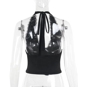 Detail view of the lace trim and back tie design on a black halter top for women