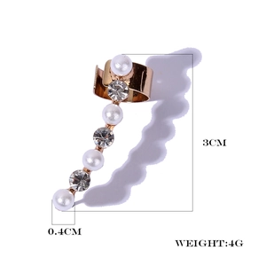 Detailed view of gold ear cuff with pearls and rhinestones including dimensions and weight