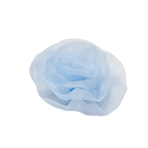 Elegant light blue mesh 3D rose flower brooch with multilayered petals on white background