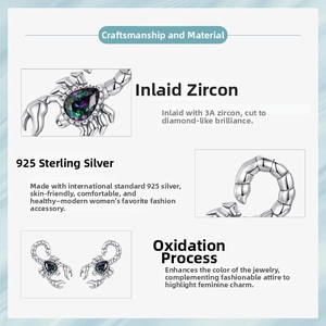 Detail of S925 sterling silver scorpion earrings with 3A grade teardrop zircon inlay