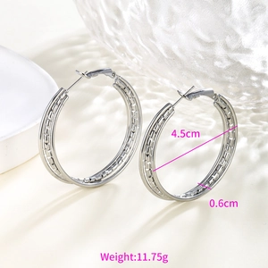 Close-up of silver chain textured double hoop earrings with 4.5cm diameter measurements