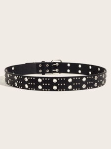 Detail shot of black PU leather punk belt with double rows of silver metal rivets