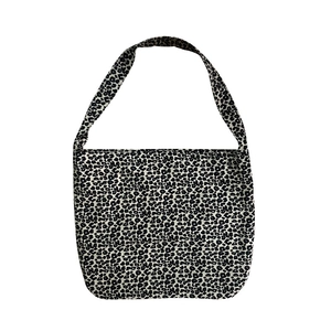 Modern black and white leopard print canvas tote bag with a spacious shoulder strap