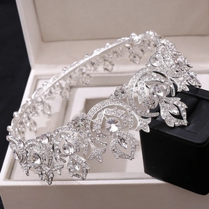 Vintage silver bridal crown with red rhinestones in a white gift box for weddings