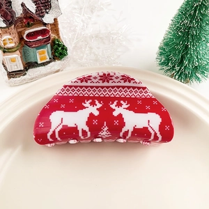 Détails de la pince à cheveux de Noël rouge avec motifs de renne et de sapin