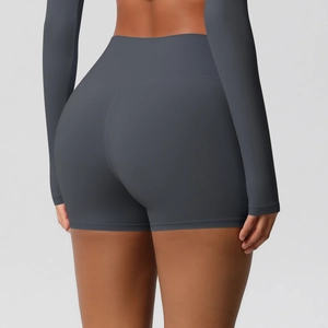 Detail view of high-waist fitness shorts featuring butt-lifting and seamless design