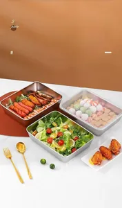 Detail of square stainless steel food containers with transparent lids for meal prep