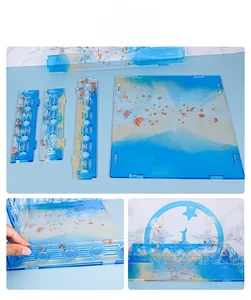 Detail view of assembling Eid themed resin storage tray with gold foil and blue texture