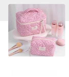 Pink quilted cotton floral makeup bag set with top handle and satin zipper pulls
