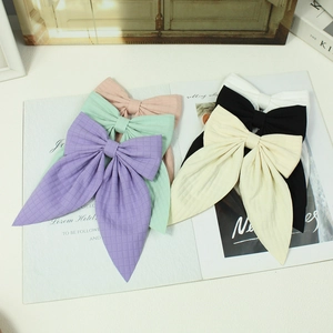 Handmade quilted bow hair clips in purple, green, pink, beige, black and white set