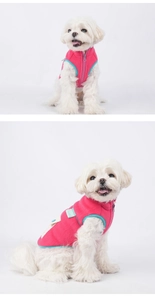 Close-up of pink fleece dog vest featuring a zipper closure and decorative woven label