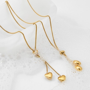 Minimalist vintage gold heart pendant necklace with pull-out chain for elegant women