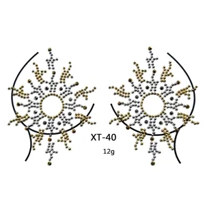 Detailed view of XT-40 rhinestone body jewelry with sunflower sunburst pattern and beads