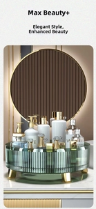 Green rotating cosmetic organizer with vertical stripes and golden legs on marble