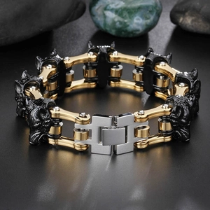 Detail of industrial motorcycle chain bracelet with black wolf head emblem in 45-degree view
