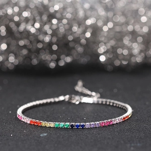 Detailed close-up of 2MM S925 silver tennis bracelet with rainbow colored gemstones