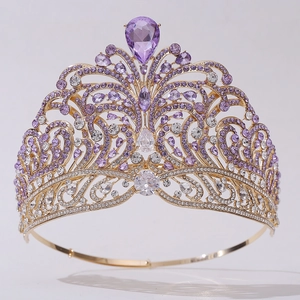 Macro shot of silver crown featuring sparkling purple and clear teardrop-shaped crystals