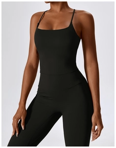 Detail of high-waist black yoga leggings and square neck sports bra for workout