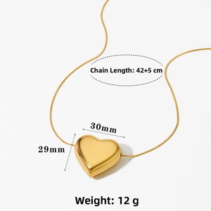 Detailed view of 30x29mm 3D hollow heart pendant with polished 42+5cm snake chain