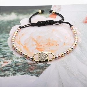 Adjustable black cord bracelet with colorful copper beads and zircon heart lock charm