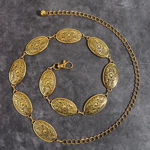 Vintage antique gold waist chain with turquoise accents and floral engraved oval links