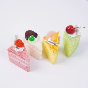 Set of four colorful triangle mousse cake squishy toys for stress relief and decor