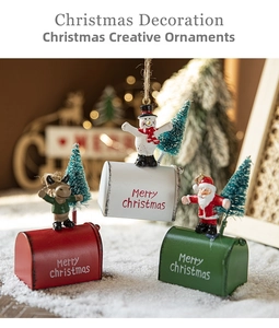 Three festive Christmas mailbox ornaments with Santa, snowman and reindeer figures