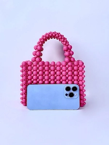 Handmade pink acrylic pearl beaded handbag with woven design and round beads