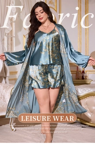 Detailed view of luxury three-piece satin loungewear set with floral prints on pajama robe