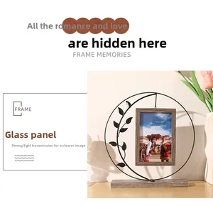 Detail of metal circular frame with leaf accents and high transparency glass panel